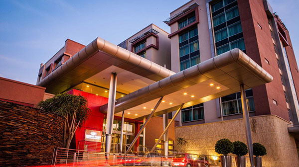 Smile at a stranger at the Southern Sun Rosebank