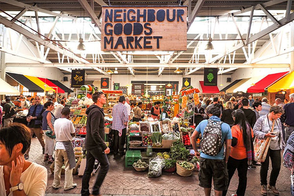 Have a cocktail while shopping at an outdoor market at the Neighbour Goods Market