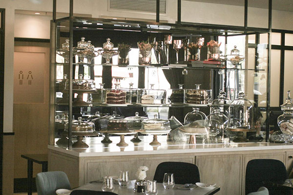 Have an espresso at Olives & Plates 140 West